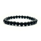 Bracelet en tourmaline noire, perles de 6 mm, sur fond blanc